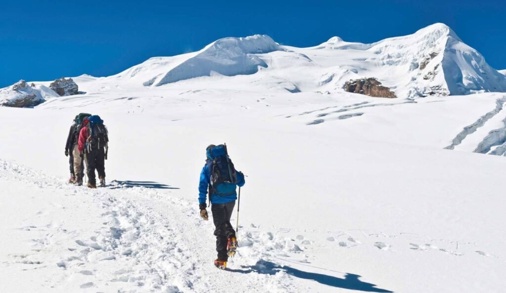 Mountaineers climbing snow summit Mera Peak Climbing